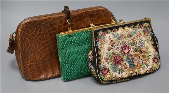 A vintage ladies crocodile skin handbag and purse, a green-paste set evening bag and a tapestry evening bag